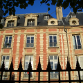 Stop in Le Marais for a guided walk through one of Paris’s historic neighborhoods. Continue to Place des Vosges, where arcades, gardens, and elegant f
